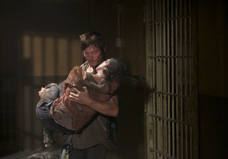 Daryl Dixon (Norman Reedus) and Carol (Melissa Suzanne McBride) - The Walking Dead - Season 3, Episode 6 - Photo Credit: Blake Tyers/AMC