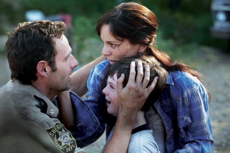 Rick Grimes (Andrew Lincoln), Lori Grimes (Sarah Wayne Callies) and Carl Grimes (Chandler Riggs) on \"Walking Dead\" season one.