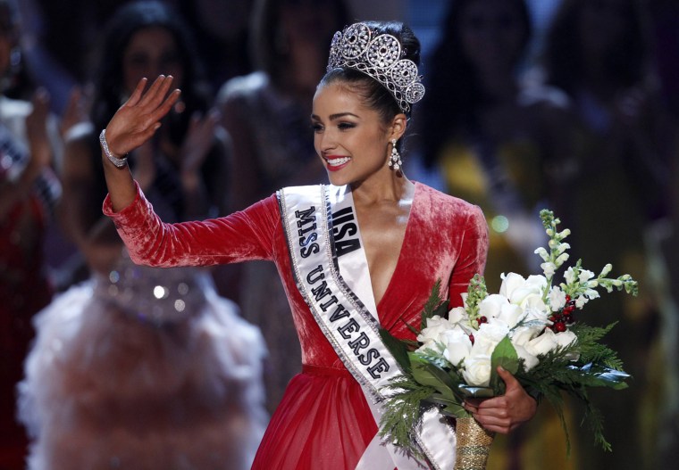 Image: Miss USA Culpo waves after being crowned during the Miss Universe pageant in Las Vegas
