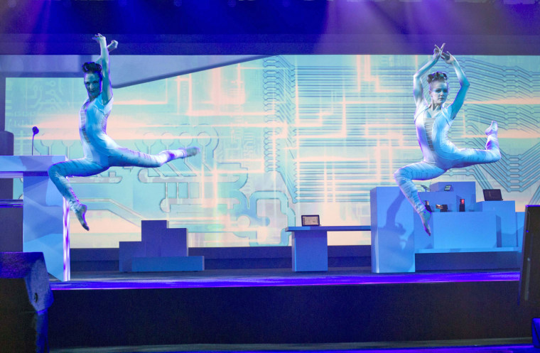 Image: Dancers perform during a Samsung Electronics keynote address at the CES in Las Vegas