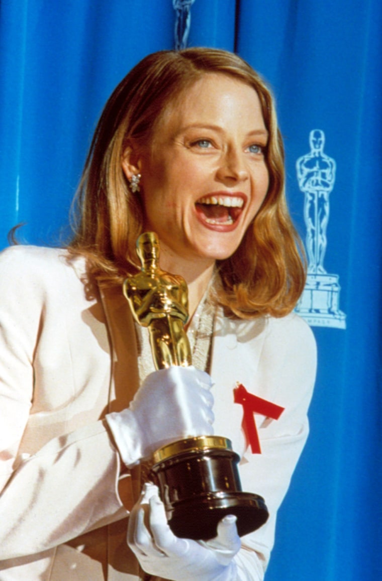 JODIE FOSTER holds her Best Actress Oscar for SILENCE OF THE LAMBS, 1992