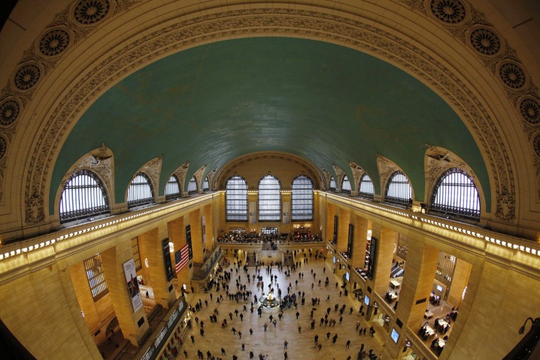 Image: Commuters move through the grand hall of Grand Central Terminal in New York