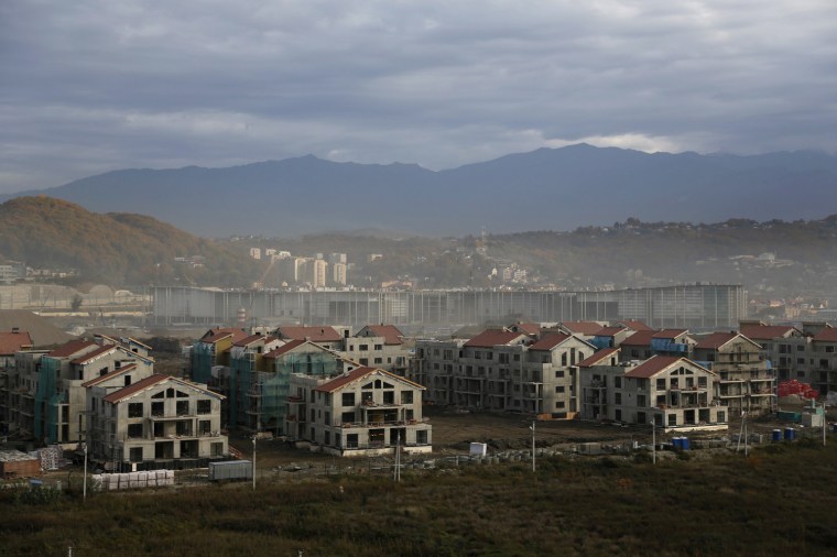 Image: A general view of the Olympic village to be used for the Sochi 2014 Winter Olympics, which is under construction, is seen in Sochi