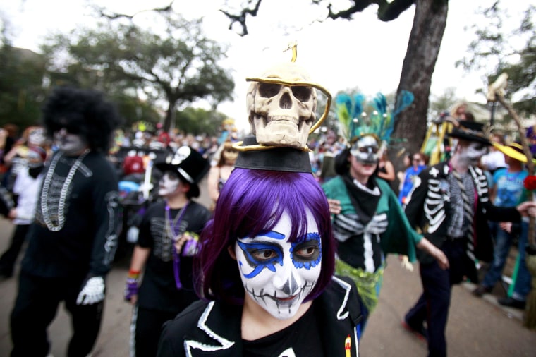 Image: Members of the Krewe of Okeanos parade down St. Charles Avenue during the weekend before Mardi Gras in New Orleans, Louisiana