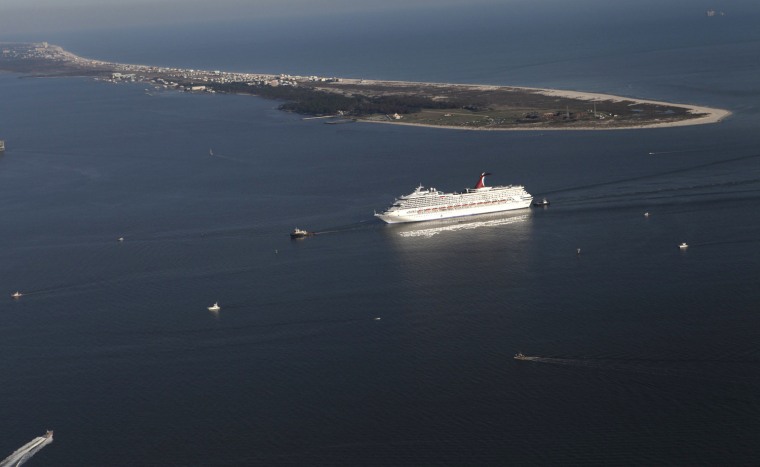 Image: The Carnival Triumph cruise ship is towed towards the port of Mobile