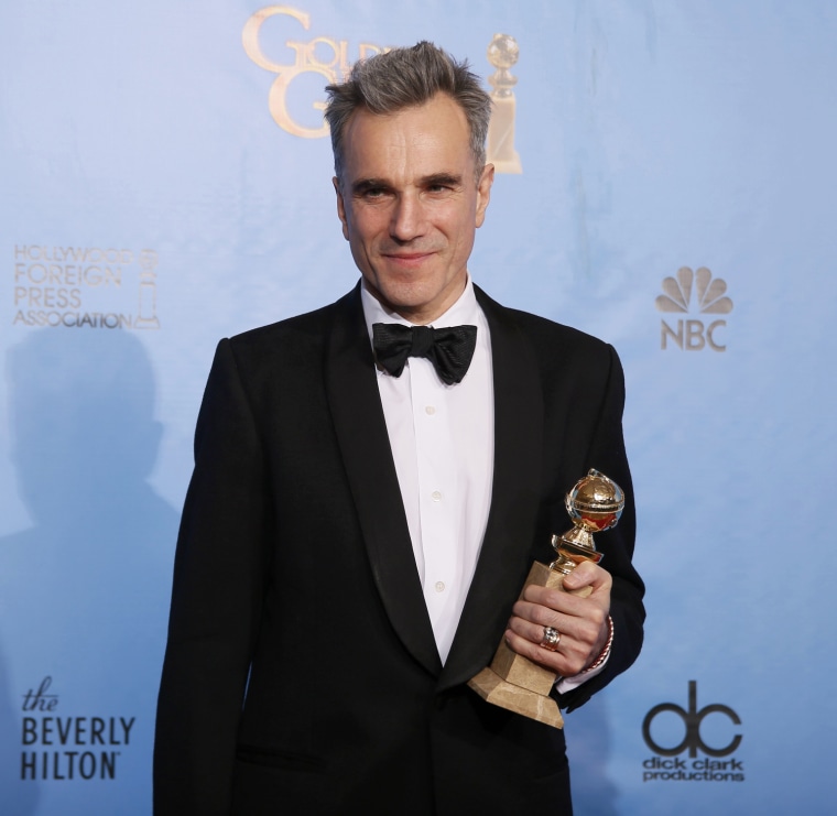 Image: Daniel Day-Lewis, winner for Best Actor in a Motion Picture, Drama for \"Lincoln,\" poses with his award backstage at the 70th annual Golden Globe Awards in Beverly Hills