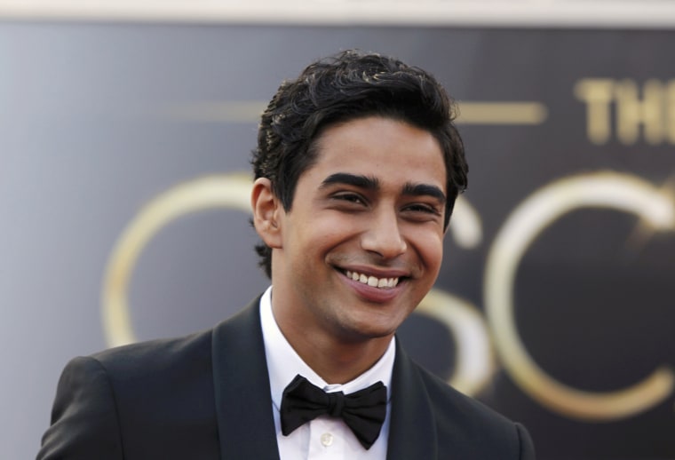 Image: Indian actor Suraj Sharma, of the film \"Life of Pi\", arrives at the 85th Academy Awards in Hollywood