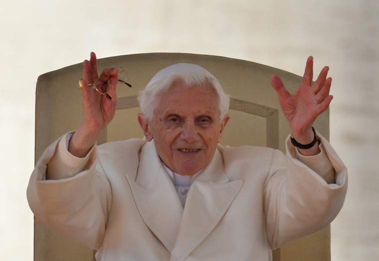 Image: Pope Benedict XVI waves from the altar during his last weekly audience.