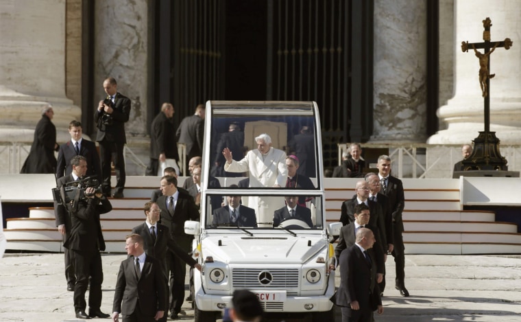 Image: Pope Benedict XVI waves to the faithful after holding his last general audience at the Vatican
