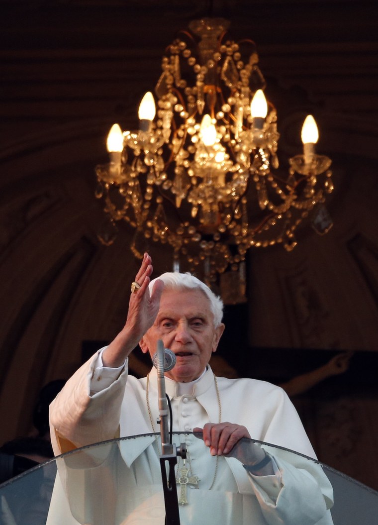 Image: Pope Benedict XVI blesses the faithful for the last time from the balcony of his summer residence in Castel Gandolfo