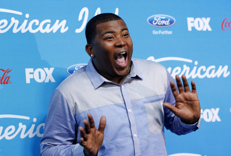 Image: Finch gestures at the party for the finalists of the television show \"American Idol\" in Los Angeles