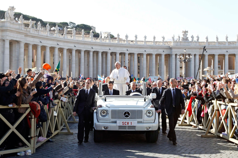 Image: Pope Francis arrives in Saint Peter's Square for his inaugural mass at the Vatican
