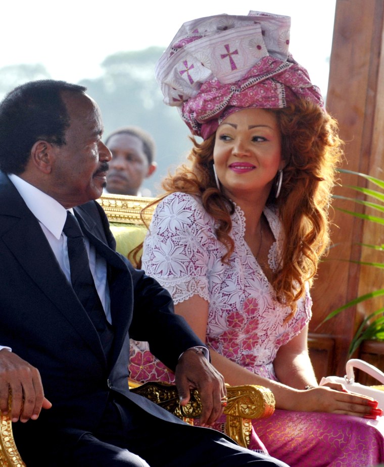 Cameroon's President Paul Biya (L) and h