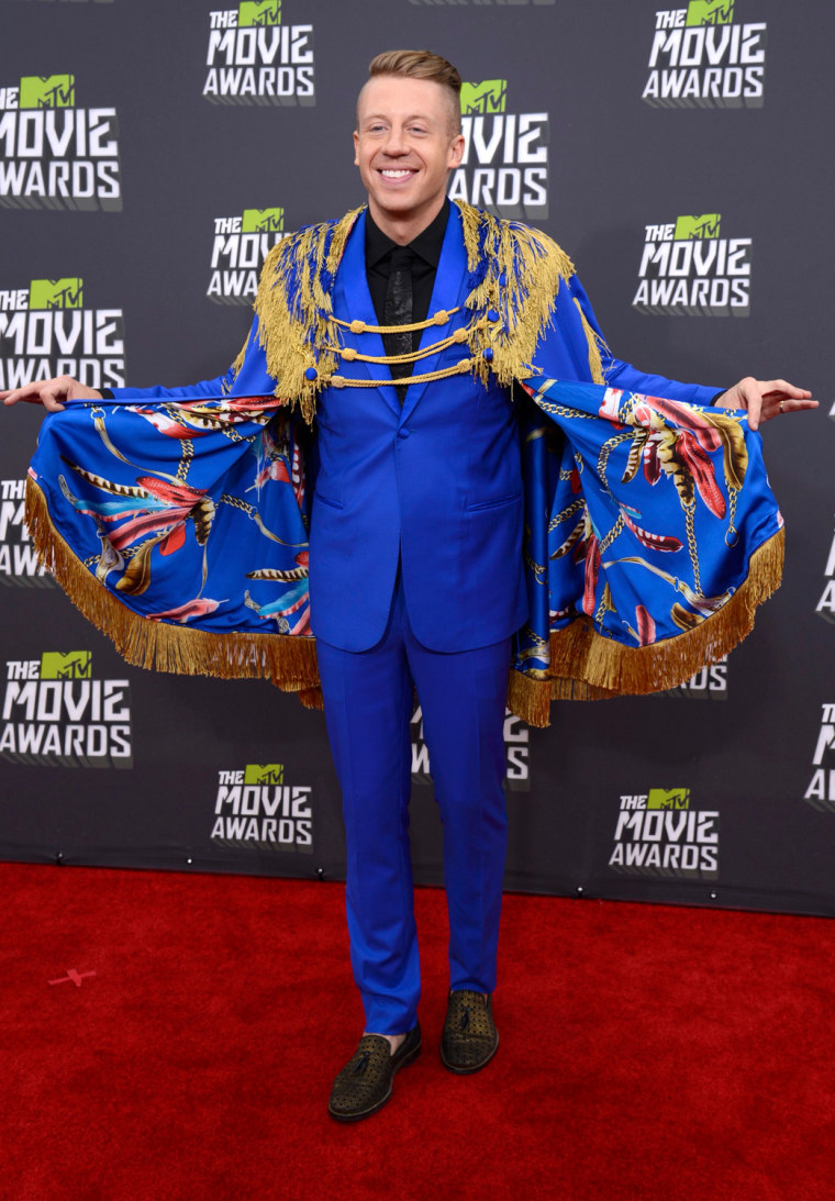 Image: Rapper Macklemore arrives at the 2013 MTV Movie Awards in Culver City