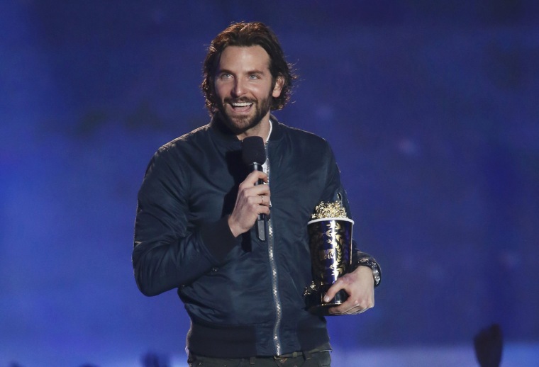 Image: Actor Bradley Cooper accepts the award for best male performance for \"Silver Linings Playbook\" at the 2013 MTV Movie Awards in Culver City