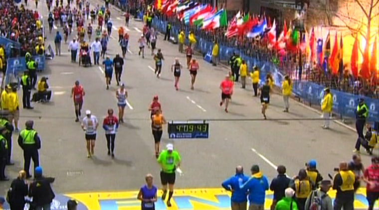 Image: NBC still image taken from video shows an explosion at the Boston Marathon
