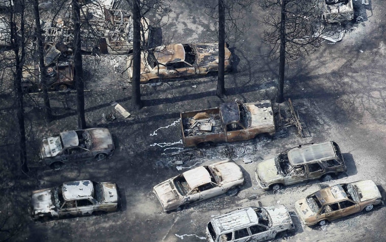 Image: An aerial view of burned out vehicles in the aftermath of the Black Forest Fire in Black Forest, Colorado