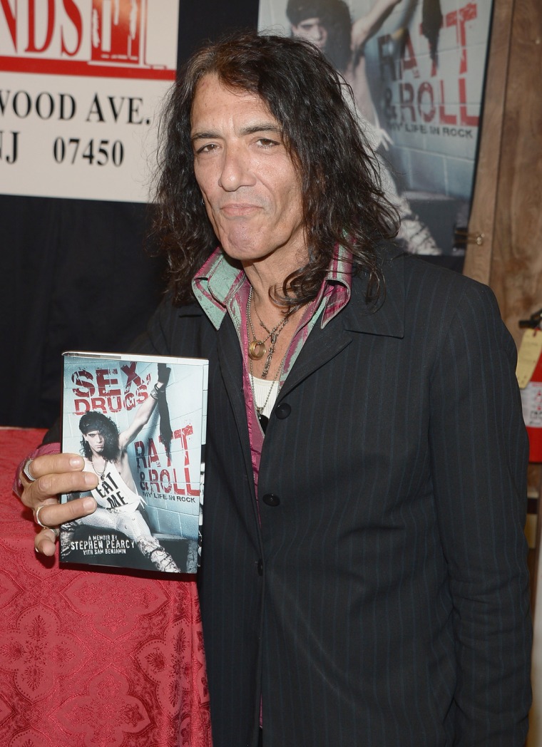 Image: Stephen Pearcy of Ratt Signs Copies Of His New Book \"Sex, Drugs And Rat And Roll\"