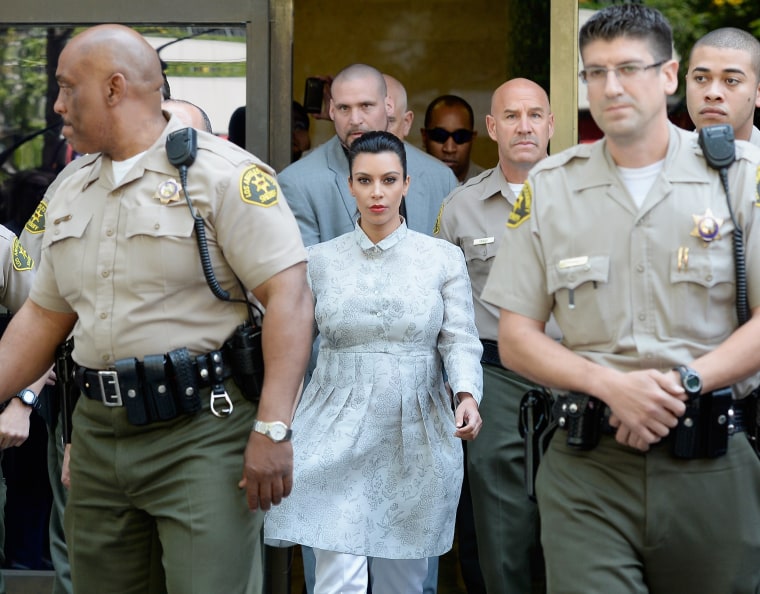 Image: (FILE PHOTO) Kim Kardashian And Kris Humphries Settle Their Divorce Kim Kardashian And Kris Humphries Attend Their Divorce Hearing