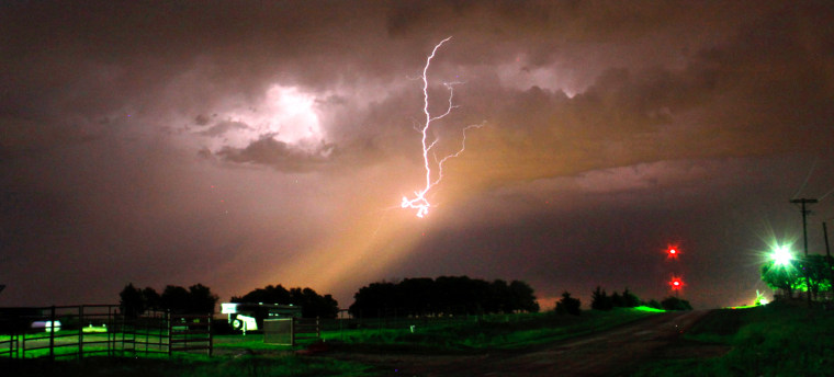 Image: Cloud-to-ground lightning from a tornadic thunderstorm strikes in Perry