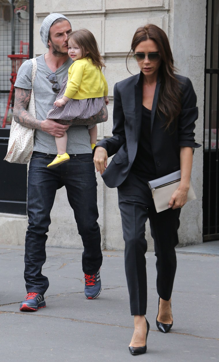 David and Victoria Beckham with their daughter Harper seen strolling in Paris