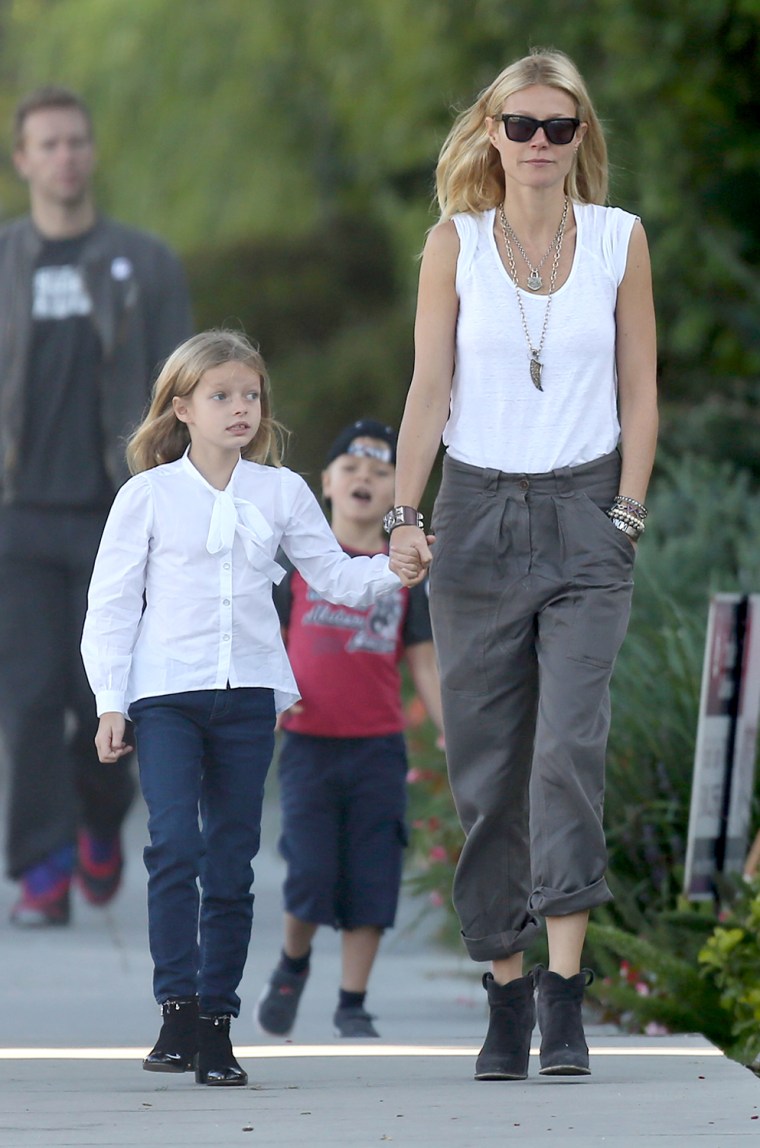 Gwyneth Paltrow and Chris Martin take Apple and Moses for a walk around Brentwood