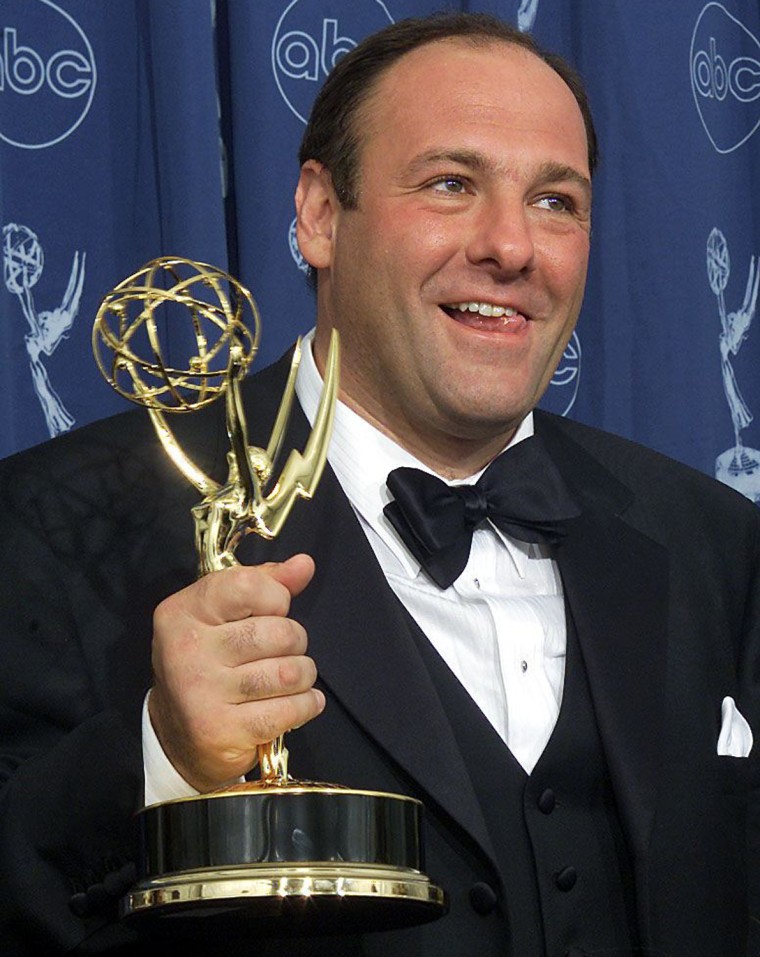 Actor James Gandolfini holds his trophy for the \"L