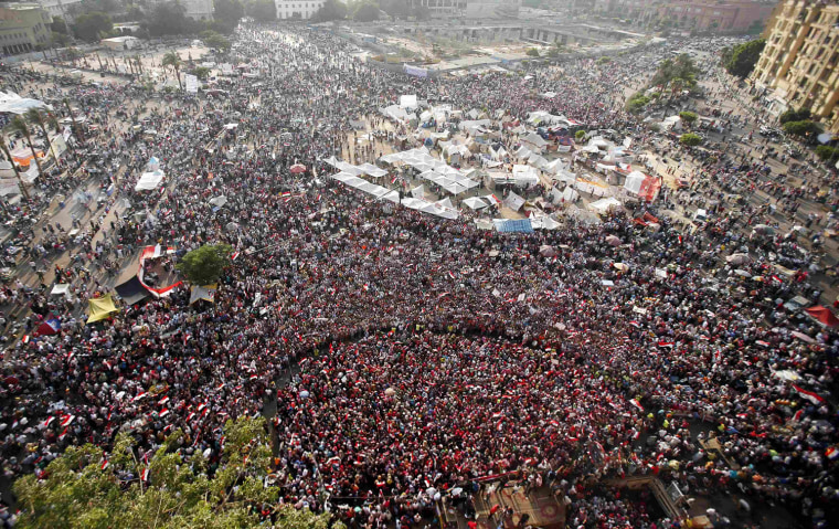 Image: Protesters opposing Egyptian President Mohamed Mursi take part in a protest demanding that Mursi resign at Tahrir Square in Cairo