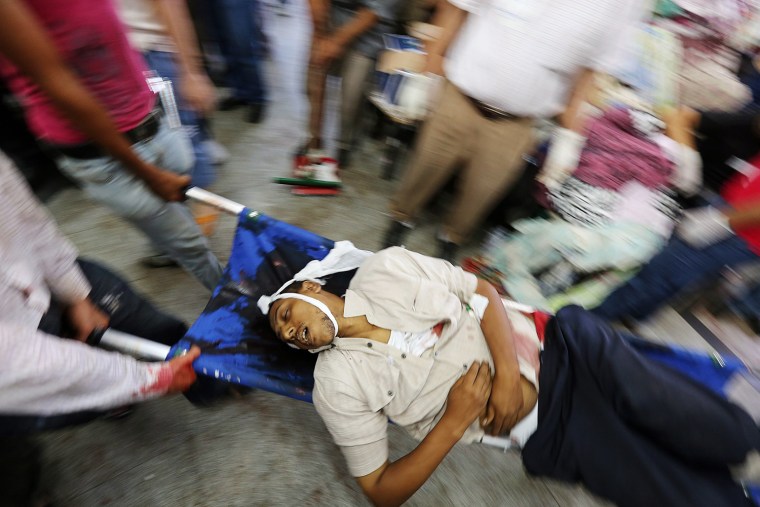 Image: Protesters killed during a sit-in by supporters of ousted President Morsi in Cairo