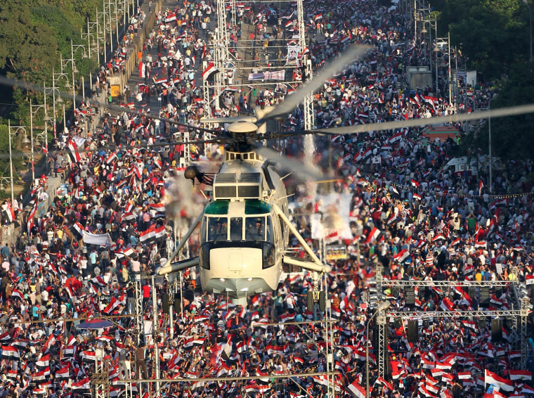 Image: Supporters and opponents of ousted President Morsi protest in Cairo