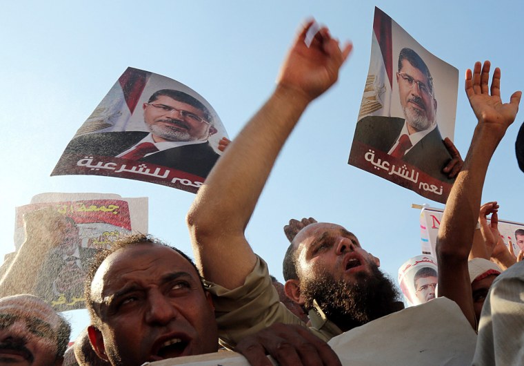 Image: Supporters and opponents of ousted President Morsi protest