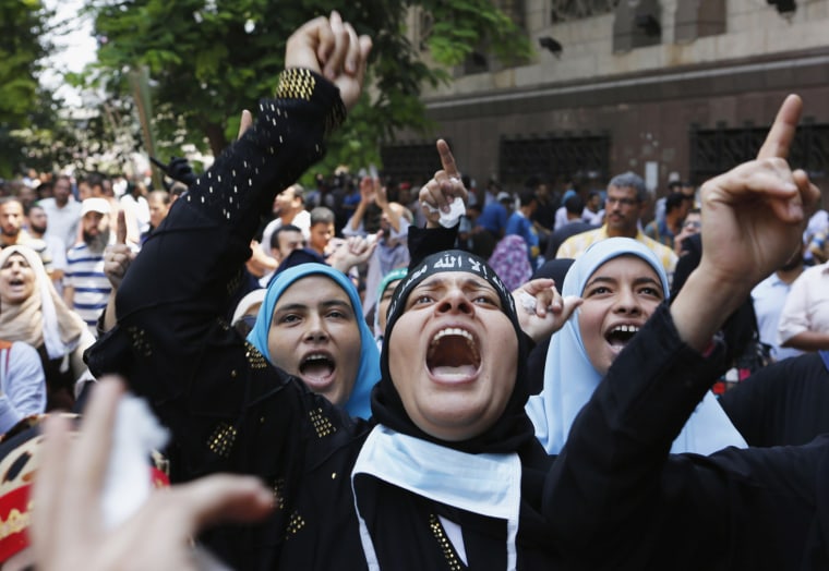 Image: Supporters of deposed president Morsi take part in protest near Ennour Mosque in Cairo