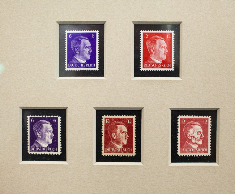 Operation Cornflakes was an OSS mission near the end of World War II that was meant to fool the German postal service into delivering anti-Nazi propaganda to Germans through the mail. The OSS created forged German stamps, as well as a subtle reworking of the 12 pfennig Hitler stamp that showed a skull emerging from Hitler’s face, with the legend “Deutsches Reich” replaced with \"Futsches (Collapsed) Reich.\"
