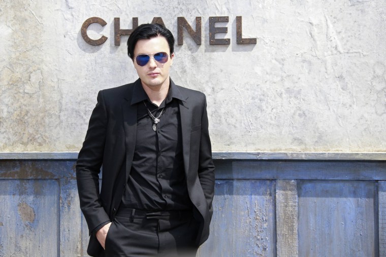 Image: Actor Michael Pitt poses during a photocall before the Haute Couture Fall Winter 2013/2014 fashion show for French fashion house Chanel in Paris