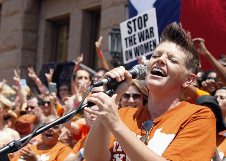 Image: Singer Natalie Maines performs at a protest before the start of a special session of the Legislature in Austin, Texas