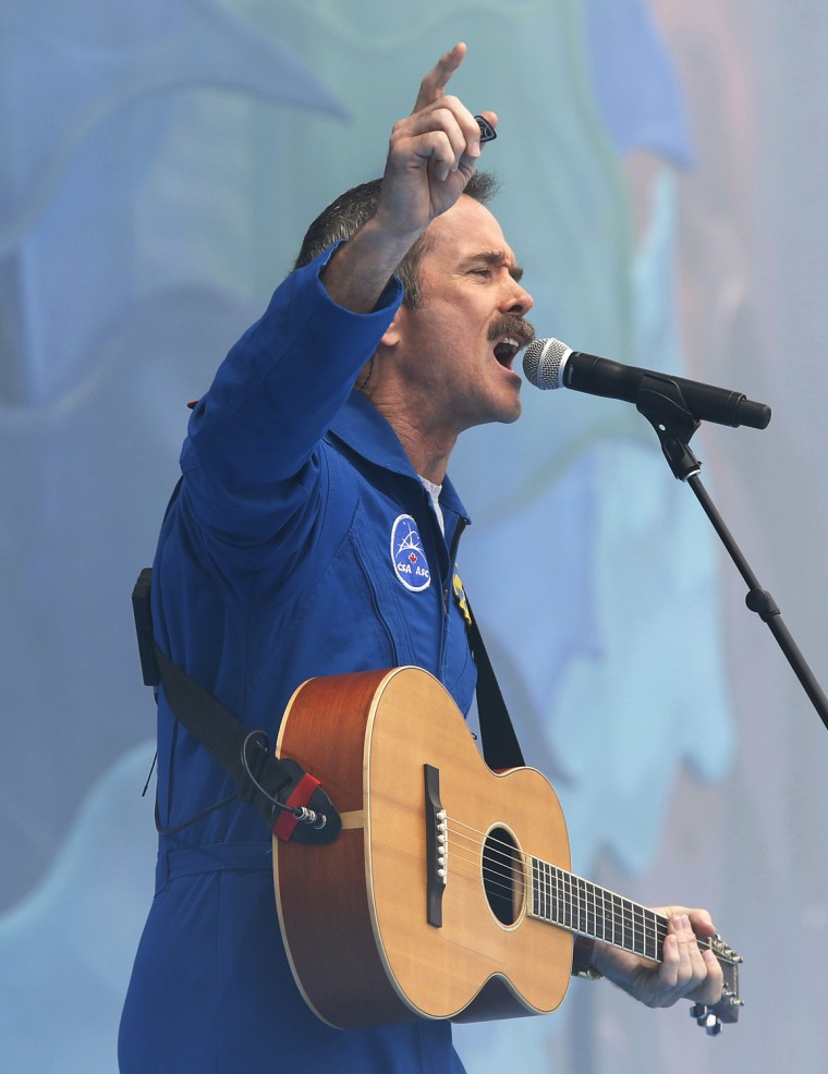 Image: Retired Canadian astronaut Hadfield performs during Canada Day celebrations on Parliament Hill in Ottawa