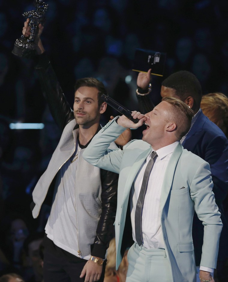 Image: Macklemore and Lewis accept the award for best hip hop video for \"Can't Hold Us\"  during the 2013 MTV Video Music Awards in New York