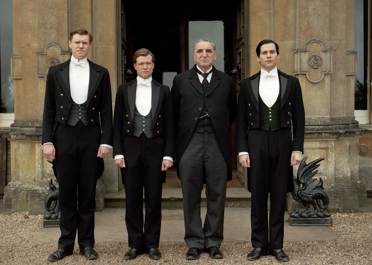 Downton Abbey S4

The fourth series, set in 1922, sees the return of our much loved characters in the sumptuous setting of Downton Abbey. As they face new challenges, the Crawley family and the servants who work for them remain inseparably interlinked.

Photographer: Nick Briggs

MATT MILNE as Alfred, ED SPELEERS as Jimmy, JIM CARTER as Mr Carson and ROB JAMES-COLLIER as Thomas