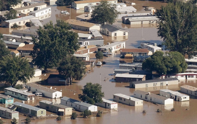Image: File of mobile homes lieing in flooded in the town of Evans, Weld County, Colorado