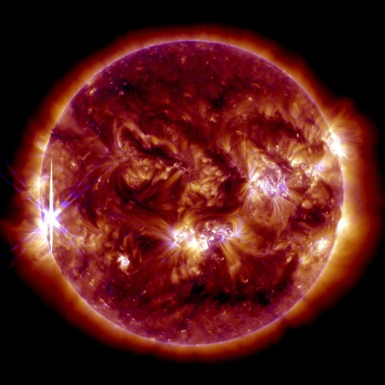 Image: A solar flare is pictured erupting from the sun in this NASA handout photo from its Solar Dynamics Observatory