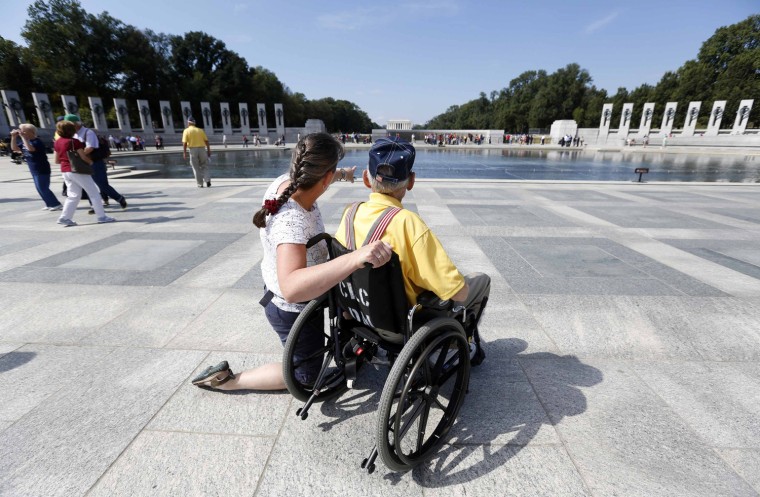 Image: A veteran tours the World War Two Memorial in Washington