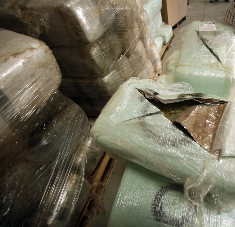 An open bundle of marijuana seized in  at a warehouse along the border between the United States and Mexico on Wednesday, Nov. 3, 2010, in San Diego. A 600 yard tunnel was discovered in the warehouse.  U.S. authorities have discovered 20 tons of pot near a tunnel.   (AP Photo/Lenny Ignelzi)
