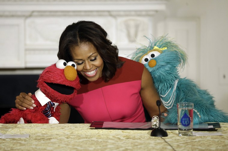 Image: Michelle Obama, Elmo, Rosita