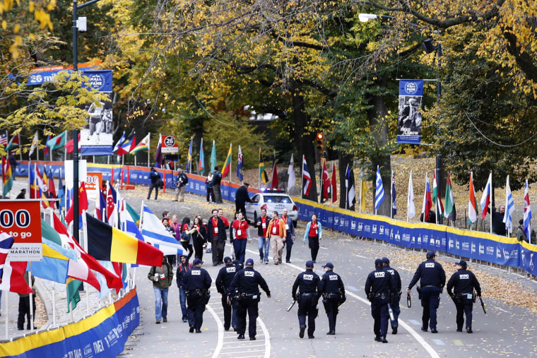 Image: New York Police Department counter-terrorism officers patrol the course near the finish line area in Central Park before the start of the New York City Marathon in New York
