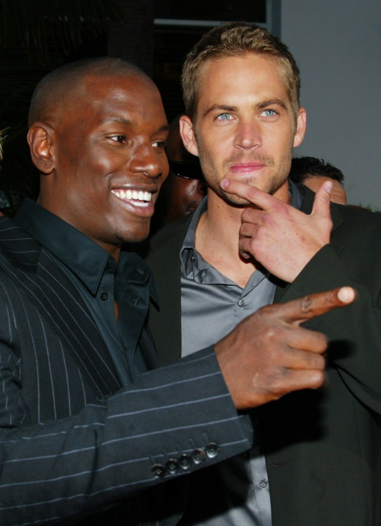 Image: TYRESE AND PAUL WALKER AT PREMIERE OF 2 FAST 2 FURIOUS.