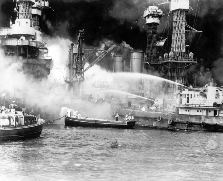 The battleship USS West Virginia is seen afire after the Japanese surprise attack on Pearl Harbor, Hawaii, on December 7, 1941. (AP Photo)