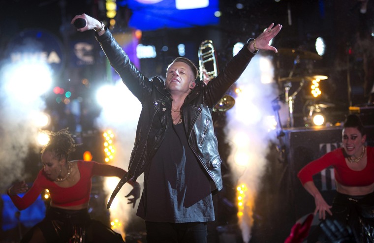 Image: Rapper Ben Haggerty performs during New Year's Eve celebrations in New York