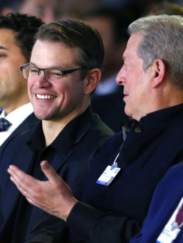 Image: Matt Damon speaks with Al Gore before the Crystal Awards Ceremony at the annual meeting of the WEF in Davos