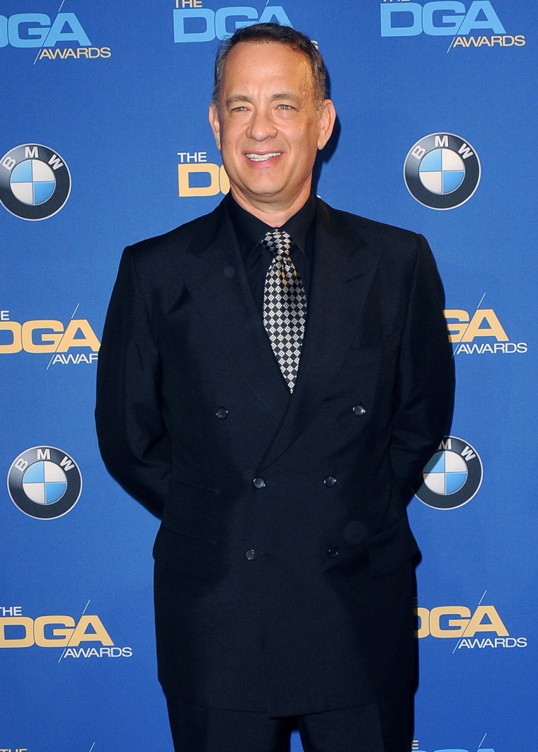 Image: Actor Tom Hanks poses during the 66th annual Directors Guild of America Awards in Beverly Hills, California