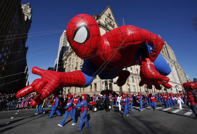 Image: The Spiderman balloon floats down Central Park West during the 87th Macy's Thanksgiving Day Parade in New York